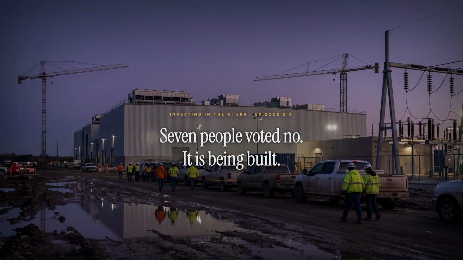 A data-centre construction site at dusk under transmission pylons and cranes, workers in high-visibility jackets on the wet ground; the title reads: Seven people voted no. It is being built.